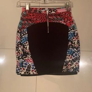 BEBE Petite Black Mini skirt.